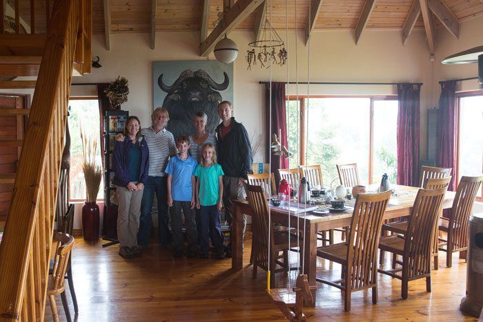 Tim, Julie, Tyler and Kara posing with their hosts Dieter and Tina at Panorama Lodge in Knysna, South Africa
