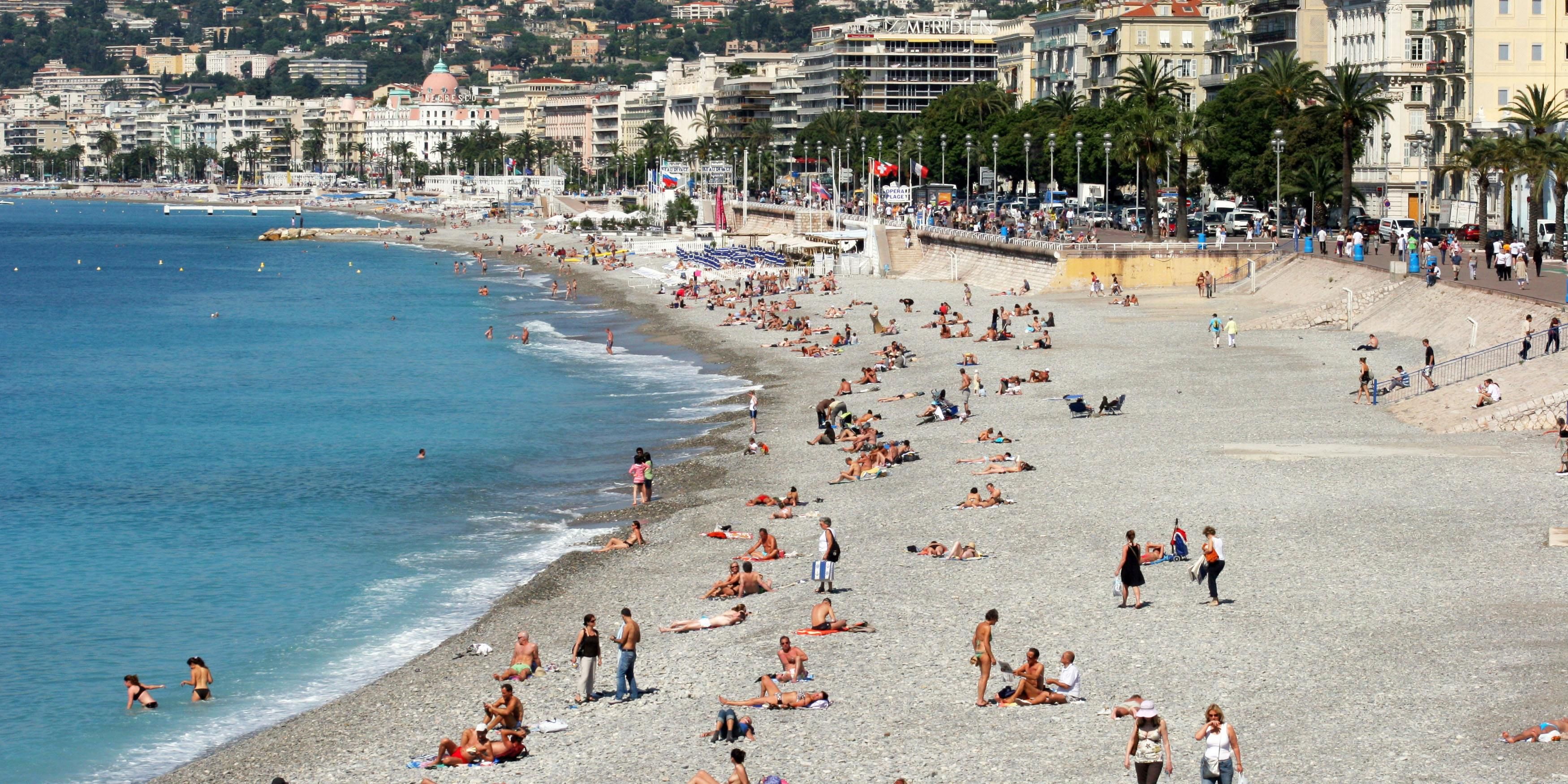 a group of people on a beach