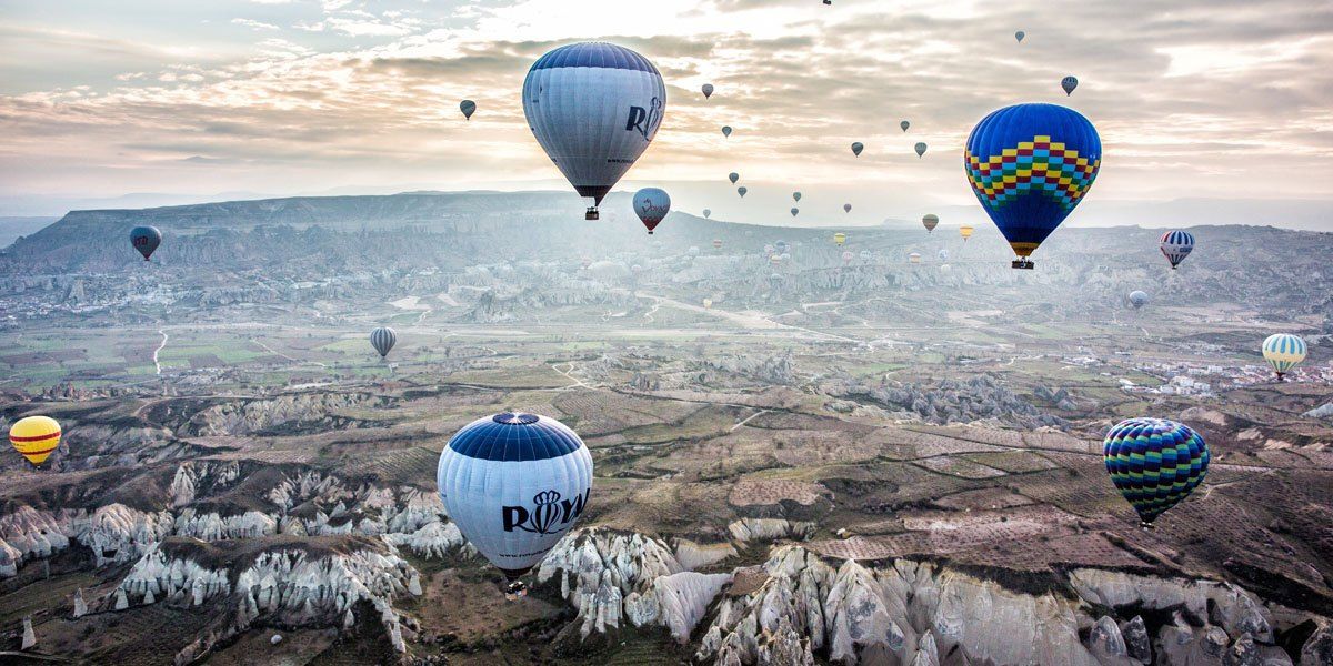 a group of hot air balloons in the sky