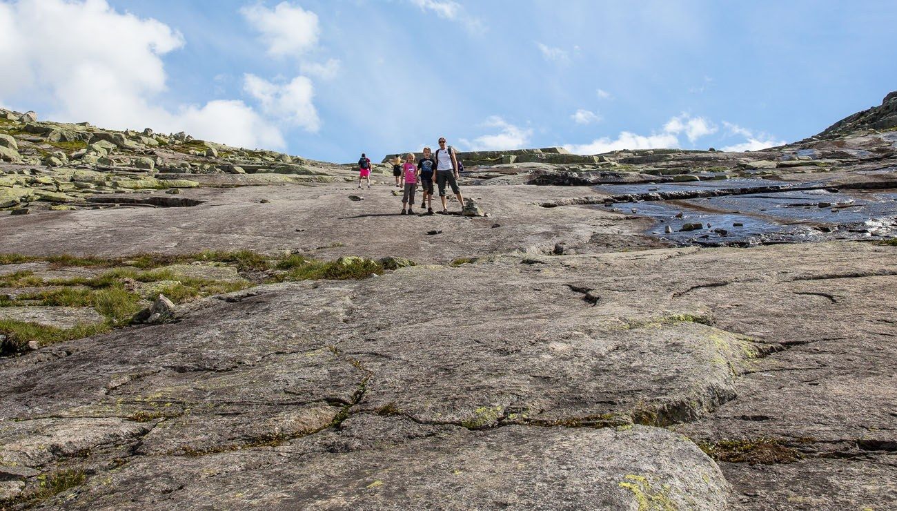 Granite face climb of Trolltunga