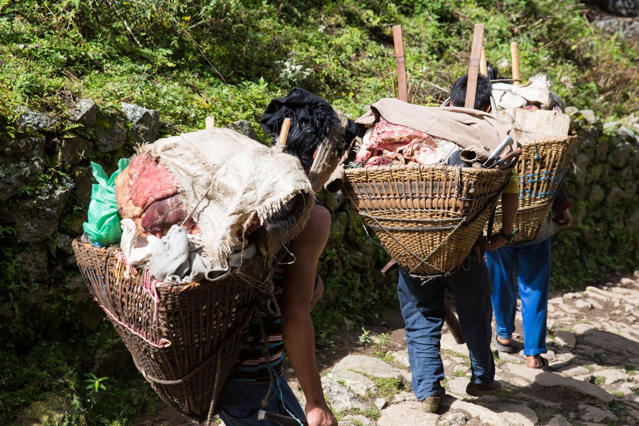 Porters carrying meat