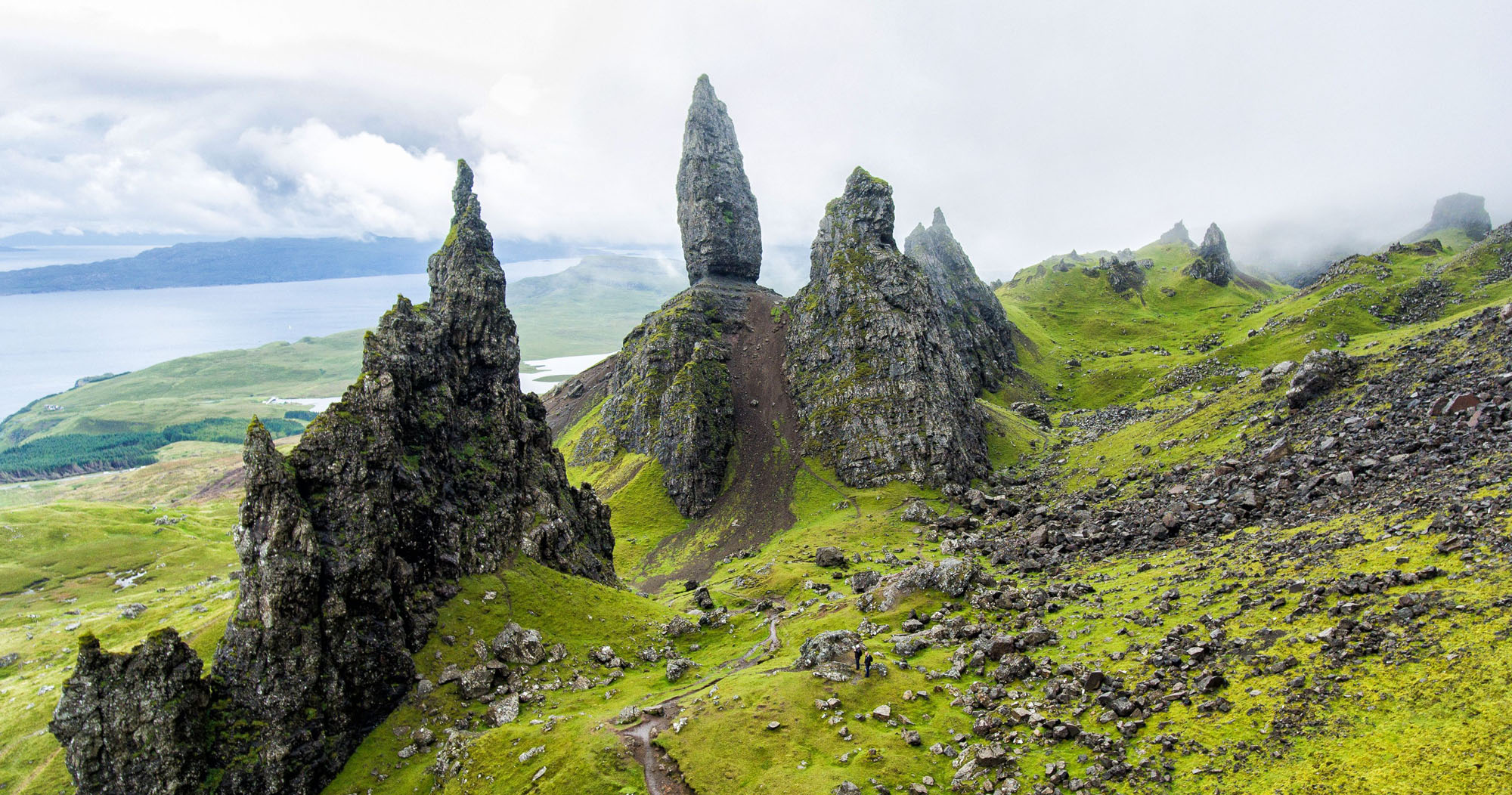 The Old Man of Storr, Isle of Skye — dramatic pinnacle rocks against a moody Scottish sky