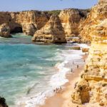 Best beaches in Algarve, Portugal. On the list are Camilo Beach, Marinha Beach, Praia dos Tres Irmaos, Praia Dona Ana, Cordeira Beach, Praia dos Arrifes, and more.